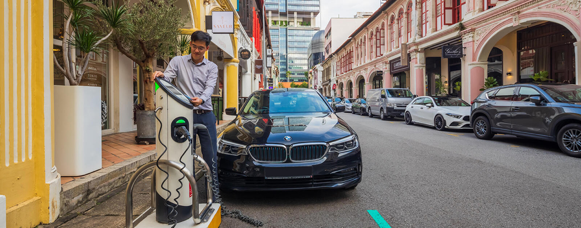 Customer using his card at Purvis Street charging station, Singapore