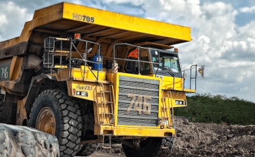 yellow truck on a coal mine