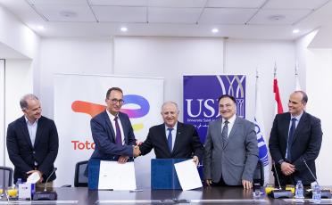 signing ceremony between TotalEnergies Marketing Lebanon and Saint Joseph University of Beirut (USJ) to transform two of the university campuses into solar-powered hubs