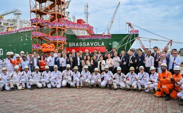 Group photo of employees for the naming of Brassavola ceremony