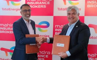 signing ceremony between TotalEnergies and Mahindra Insurance Brokers