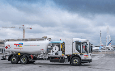 TotalEnergies sustainable aviation fuel truck at an airport