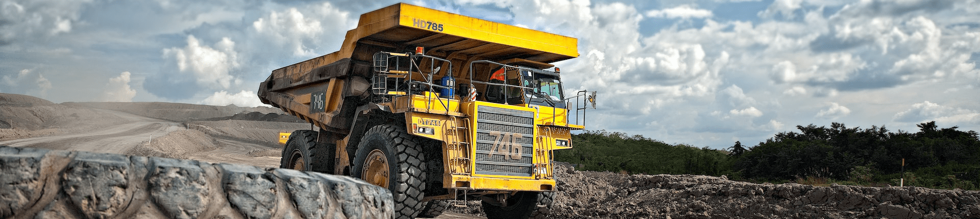 yellow truck on a coal mine
